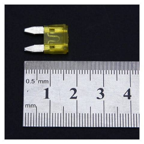 Close-up of yellow blade fuse with ruler for size, part of 60 And 120 Piece Car And Truck Blade Fuses Kit 5A 10A 15A 20A 25A 30A.