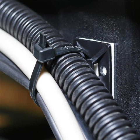 Heavy Duty Self Adhesive Zip Tie Mounts Kit in use with 8-inch zip tie securing cables to wall using adhesive mounting base and screw