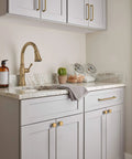 Champagne Bronze Cabinet Pull Five And Nine Sixteenth Inch Overall Length And Five And One Sixteenth Inch Center To Center Mounting on kitchen cabinets.