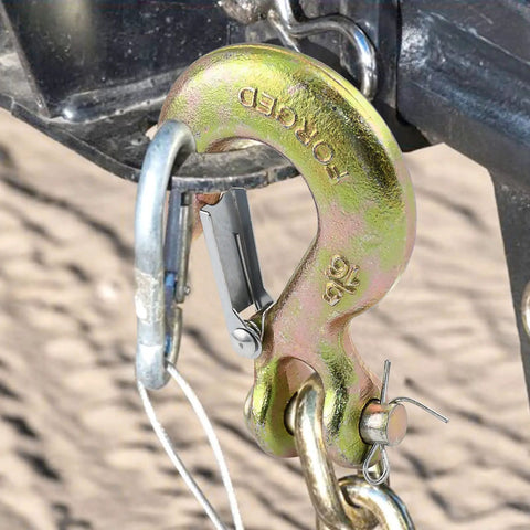 5/16 Chain Hook With Safety Latch Heavy Duty Clevis Slip Hook Grade 70 Forged Steel 14,000 Lbs Capacity Ideal For Towing, Rigging, And Industrial Construction Projects attached to a chain