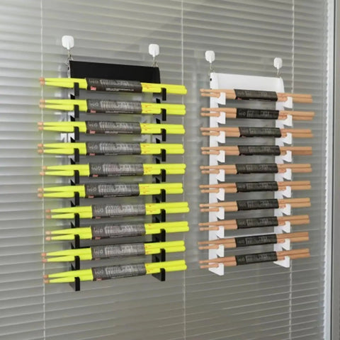 Keep Your Kit Tidy And Looking Fly With This Premium Clear Acrylic Drumstick Holder Display Rack That Frees Up Floor Space For Every Shredder And Doubles As A Sweet Gift. Two acrylic drumstick racks with yellow and natural sticks.