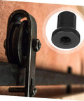 Close-up of a 4 Pack Carbon Steel Sliding Barn Door Track Spacers And Connectors For Wall And Rail Track Spacer Assemblies installed on a door