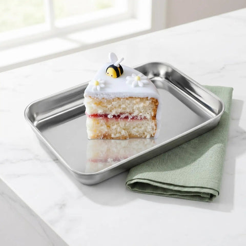 Slice of cake on Six Pack Stainless Steel Plates For Everyday Dining 9.2 Inch By 7 Inch Dimensions Food Grade Non Toxic Lead Free