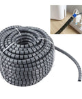 Close-up of grey Spiral Cable Wrap For Cable Management Protector Cover 32mm Diameter 30m Long, showing installation on power cords.