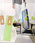 Person using vacuum with two Type CC Vacuum Bags 12 Pack For Oreck XL Upright Vacuum Cleaners Fits XL2100RHS U2000R displayed