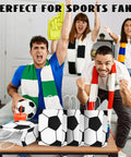 12 Pack Soccer Themed Party Favor Bags With Handles on table, surrounded by cheering people, perfect for sports events.