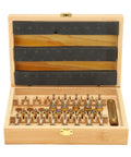 Pro Grade Mainspring Winder Tool Kit With Copper Construction in open wooden box, showing 20 winders and handle