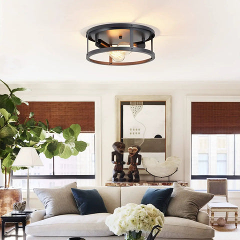 Living room with 2 Pack 13 Inch Matte Black Flush Mount Ceiling Light Fixture, open frame design, E26 base, industrial farmhouse style.