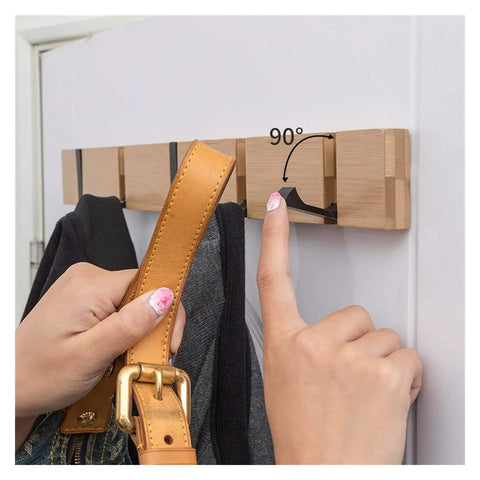 Wall Mounted Nailless Folding Coat Hook Set Featuring Twin Bar Design for Hallway Closet Entryway, person using a leather strap.