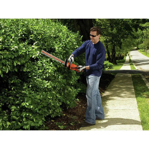 Person using Powerful 20V Max Cordless Hedge Trimmer No-Fuss 22 Inch Dual Action Steel Blade Tool Only Lightweight Soft Grip