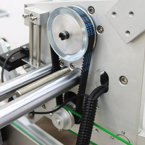 Fully Automatic Desktop Top And Side Labeler Machine With Adjustable Speed Control Fits Bottle Sizes From 1.57 To 3.9 Inches showing detailed drive system.