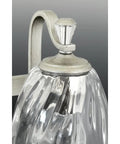 Close-up of clear water glass shade on Anjoux Dope Two Light Gray Bath Vanity Light with polished nickel accents.
