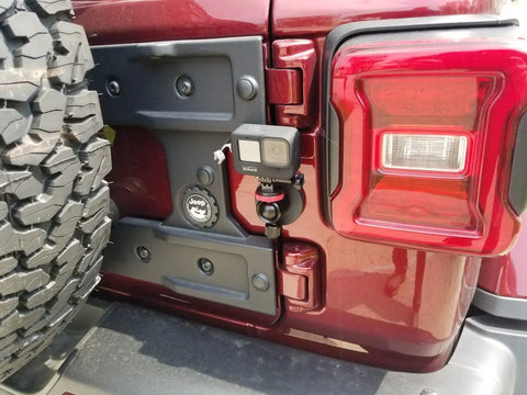 60lb Magnetic Camera Mount With Mini Ball Head Rubber Coated Neodymium Magnet Quarter Inch 20 Tpi Male Thread Stud installed on Jeep