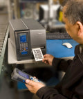 Heavy Duty Industrial Thermal Transfer Label Printer Built Different With A Rugged Metal Chassis, 4 inch label printing in use.