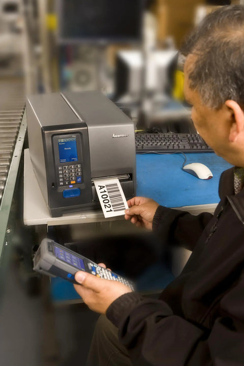 Heavy Duty Industrial Thermal Transfer Label Printer Built Different With A Rugged Metal Chassis, 4 inch label printing in use.