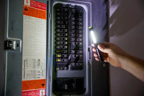 Using a Rechargeable Inspection Pen Light With 450 Lumen Flood And 140 Lumen Spot to inspect an electrical panel