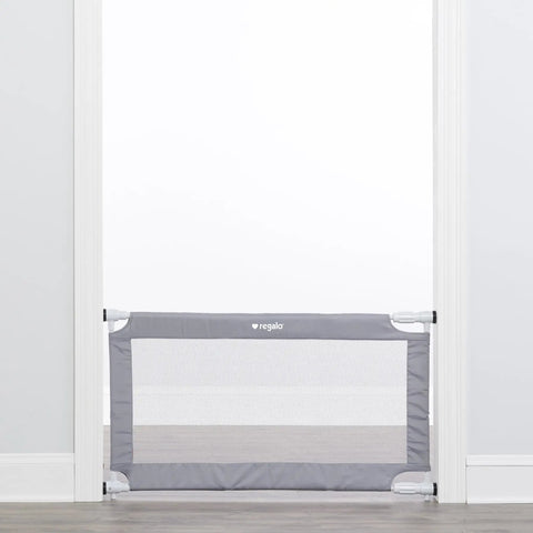 Extra Wide Mesh Baby Gate For Doorways And Hallways Expands From 27.5 To 50 Inches 28 Inches Tall Pressure Mounted For Toddlers And Pets Includes Rubber Bumpers Gray installed in doorway