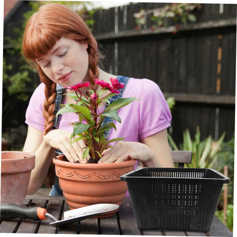 Hydroponic Net Pots And Mesh Grow Bags For Indoor Aquatic Plants, black plastic basket next to potted plant