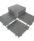 Stack of interlocking cushion PVC flooring tiles set 12x12 inches no slip drainage mats for pool patio bathroom outdoor indoor safe wet surfaces
