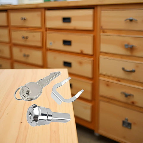 Universal Stainless Toolbox Lock With 180 Degree Rotation For Cabinets And Drawers Built Tough Cylinder Lock Includes 2 Keys And 1 Fastening Tab Fits Most Toolboxes And Cabinets. stainless lock with keys and fastening tab on wooden desk