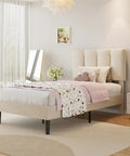 Twin Size Bed Frame Featuring Extra Thick Velvet Upholstered Headboard And Heavy Duty Hardwood Slats Pale Beige Platform Mattress Base in modern bedroom.