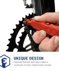 Hand using red tool on bike chainring, Get Your Chain Back On Your Bike In Three Seconds Without The Mess Quick Fix For Bike Maintenance On The Go