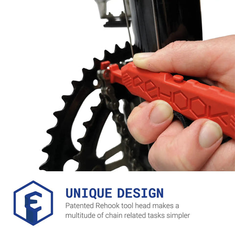 Hand using red tool on bike chainring, Get Your Chain Back On Your Bike In Three Seconds Without The Mess Quick Fix For Bike Maintenance On The Go