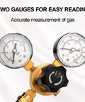 Front view of argon/CO2 welding gas regulator with dual gauges, brass body and black knob