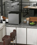 Compact Upright Freezer Silver 1.1 Cu Ft Countertop Mini Freezer Solid Pick For Dorms And Offices showcasing a modern office setup.