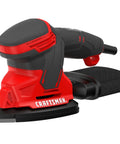 Corded Mouse Detail Sander For Woodworking With 14,000 OPM Includes Two Attachments Sandpaper Sheets And Dust Bag Ergonomic Rubber Grip Versatrack Compatible Pro Grade Finish Ready, shown with ergonomic rubber grip and black dust bag attachment in workshop setting.