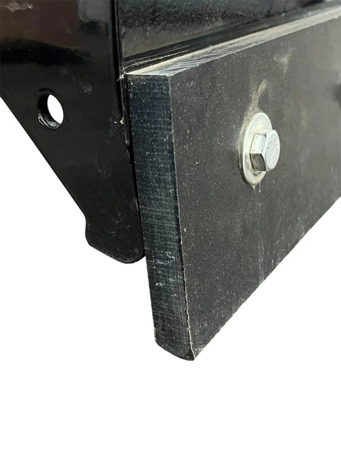 Close-up of heavy duty poly cutting edge for snow plows 96 inch one piece replacement showing bolt attachment detail.