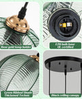 Close-up of Modern 3-Light Hand-Blown Green Glass Pendant Lighting Chandelier with ribbed texture and black ceiling canopy