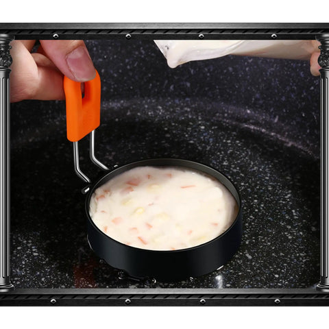 Set Of 6 Round Egg Rings And Pancake Molds With Silicone Handles, 3.5 Inch And 6 Inch Sizes, batter in round ring on stove
