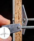 Close-up of 20 Piece Toggle Bolt Kit For Drywall M5 M6 With Wing Nuts Iron Expansion Screws being installed in hollow wall