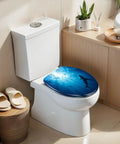 Elongated Silhouettes sharks underwater ocean against bright Toilet Seat on modern toilet with soft-close hinge.