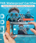 Woman snorkeling holding IPX8 Waterproof Phone Pouch 2 Pack With Lanyard For Beach Day Travel And Cruise 8.5 Inch Dry Bag Case