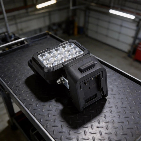 Cordless Work Light for 18V for battery High Brightness LED Floodlight on black textured surface, showcasing durable design.