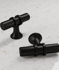 2 Pack Matte Black Cabinet Pulls T Bar Knobs For Kitchen Cupboards And Bathroom Cabinets on white surface