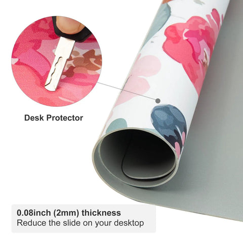 Close-up of rolled Large Pink Floral Desk Pad For Computer And Gaming Setup 31.5 Inch By 15.7 Inch Waterproof PU Leather