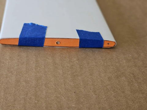 Solid Hardwood Shutter Louver Replacement Kit Five Pack showing end detail with blue tape, designed for easy installation and repair.