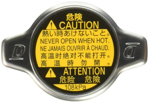 Toyota Radiator Cap Sub Assembly OEM Replacement For Engine Cooling System Dope Durable Exact Fit Cap 16401 31650 Meets Original Specifications Vehicle Maintenance Part showing caution labels in multiple languages.