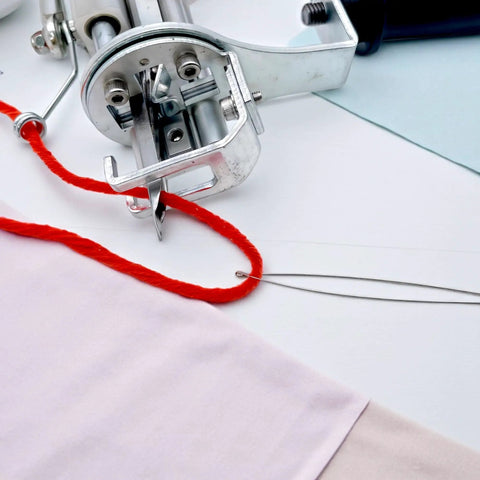 5 Pack Needle Threaders for Hand Sewing and Machine Threading with red thread, steel wire, used in textile machine setup.
