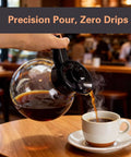 Pouring coffee into cup from carafe, related to Heavy Duty 1610W 12 Cup Drip Coffee Maker Workhorse With Two Glass Carafes And Warmers Stainless Steel Housing And Funnel Commercial Grade Brewer For Offices Hotels And Home Use