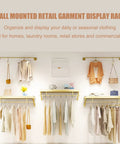 Top Shelf Wall Mounted Clothing Rack System Kit Crafted from Rock Solid Wrought Iron Pipes and Rugged Pine Boards for Boutique or Main Street Closets That Can Take Some Serious Wear and Tear, organized display of clothing.