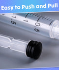 The Real Deal 3Ml Sterile Syringes With Sharp 23G 1 Inch Needles, Leak Proof Luer Lock, 100 Count Disposable Box, Heavy Duty Polypropylene For Medical And Lab Use showing easy push and pull design with black plunger.