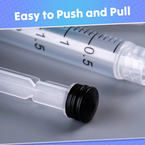 The Real Deal 3Ml Sterile Syringes With Sharp 23G 1 Inch Needles, Leak Proof Luer Lock, 100 Count Disposable Box, Heavy Duty Polypropylene For Medical And Lab Use showing easy push and pull design with black plunger.