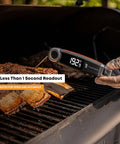 Hand holding X10 Instant Read Digital Meat Thermometer With Rotating Probe Backlit Display And Waterproof Pro Kitchen Tool on grill