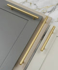 Heavy Hitter Solid Stainless Steel Bar Handles 25 Pack Euro Style Cabinet Pulls With Killer Brushed Satin Gold Brass Finish on cabinet doors