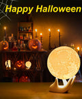Moon Lamp For Kids And Adults With Realistic 3D Moon Surface glowing in a Halloween-themed room with decorations