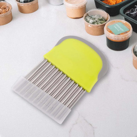 Crinkle cutter knife with yellow silicone handle and stainless steel blade for slicing potatoes and veg front view